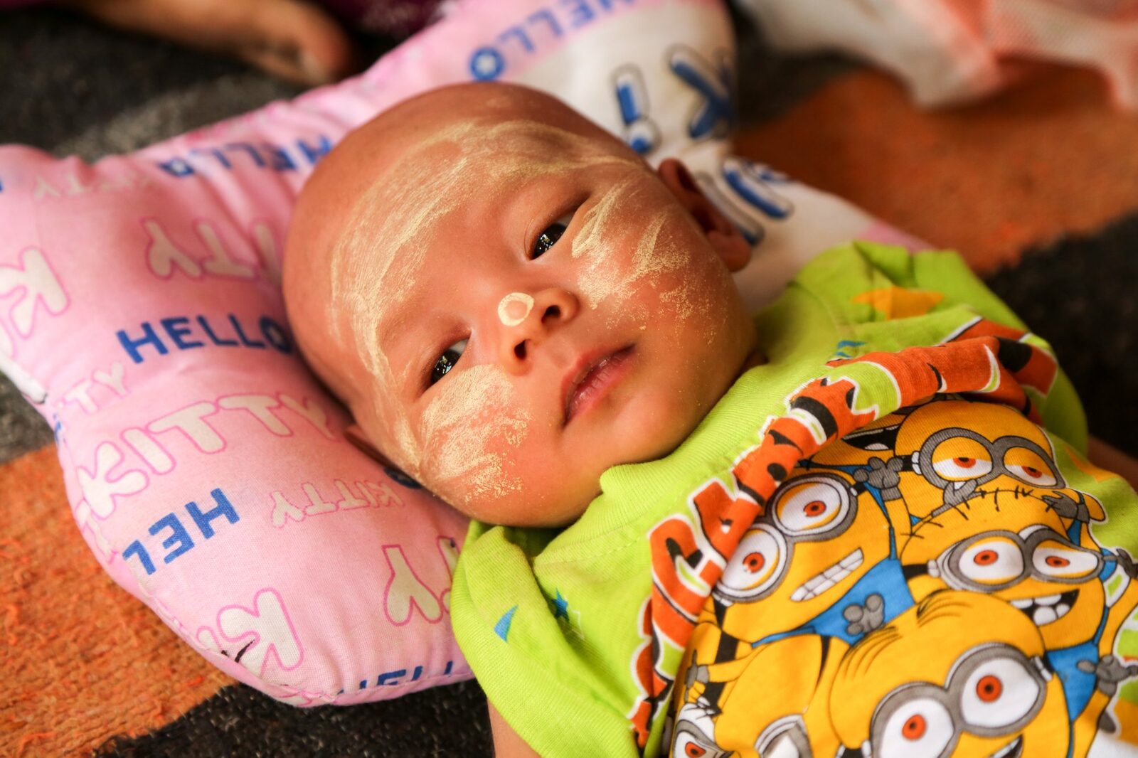 Burmese baby with thanaka paste