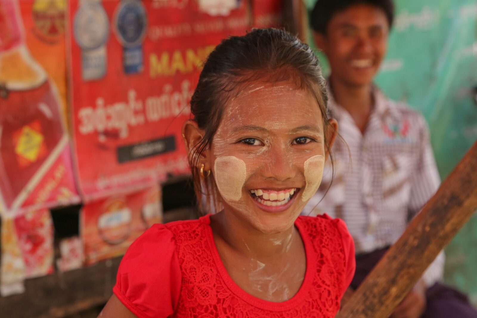 Burmese girl smiling with thanaka