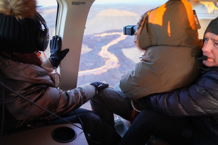 Helicopter over active lava flow